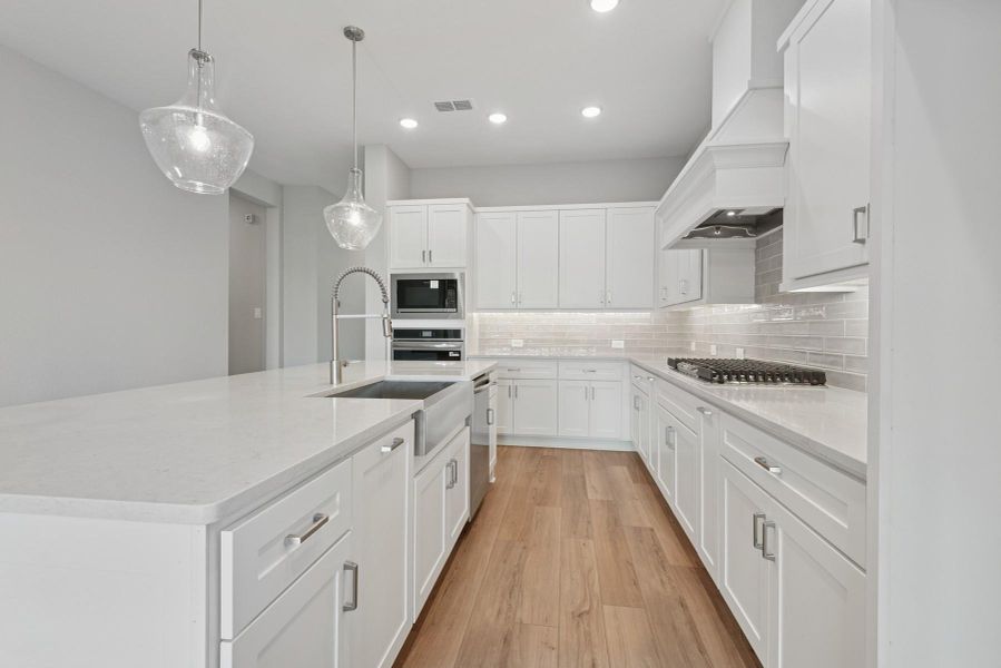 Furnished interior view inside a new home in ARTAVIA 45' Homesites, Conroe (Image 9).