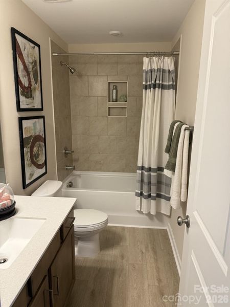 Furnished interior view inside a new home in Sloan Station, Charlotte (Image 7).