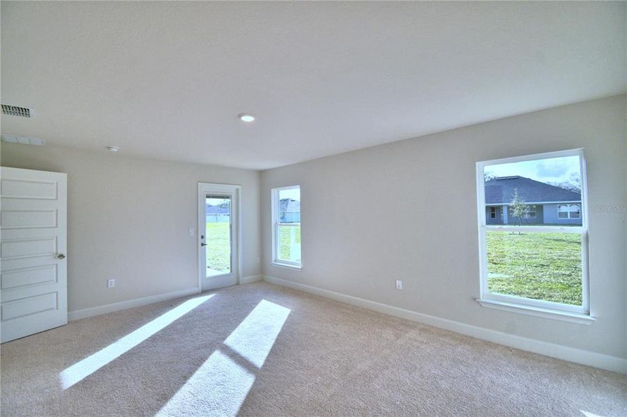 Spacious, unfurnished interior of a new home in Cadence Crossing, Auburndale (Image 28).
