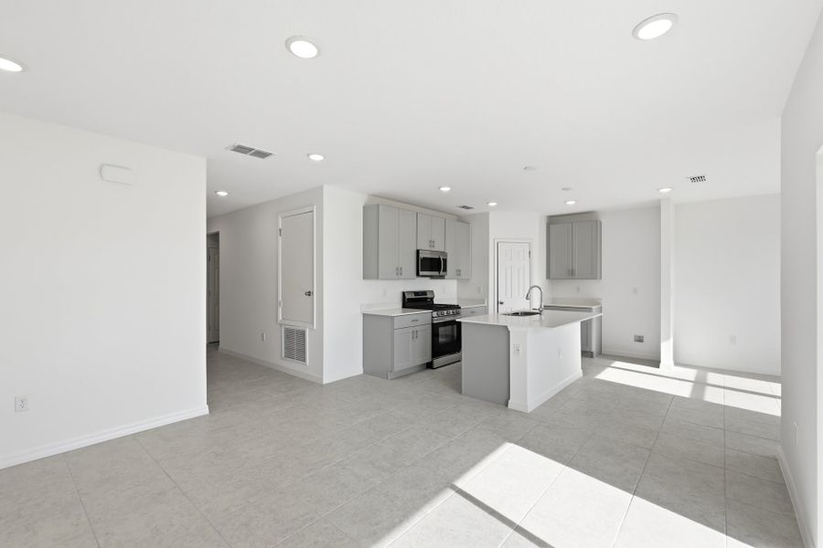 Furnished interior view inside a new home in Highfield at Twisted Oaks, Wildwood (Image 5).