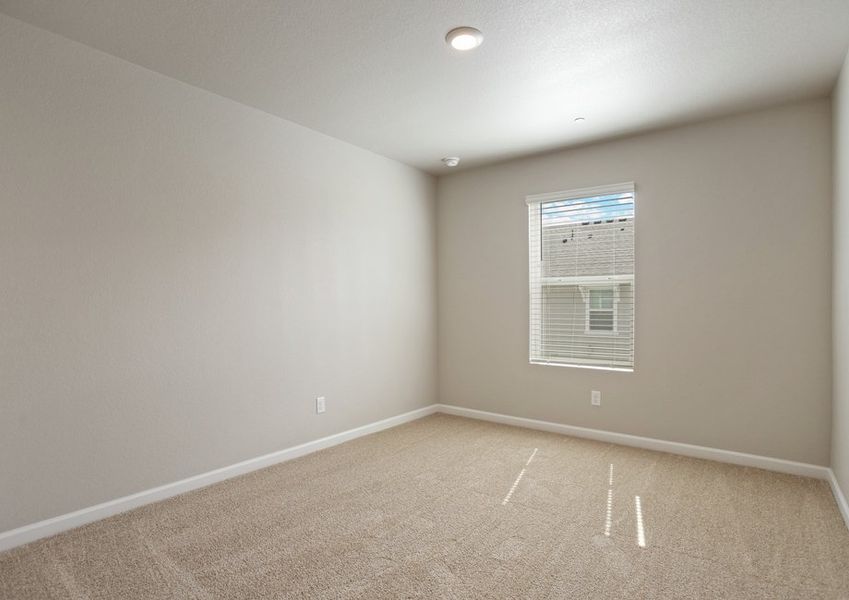 The secondary bedroom has carpet.