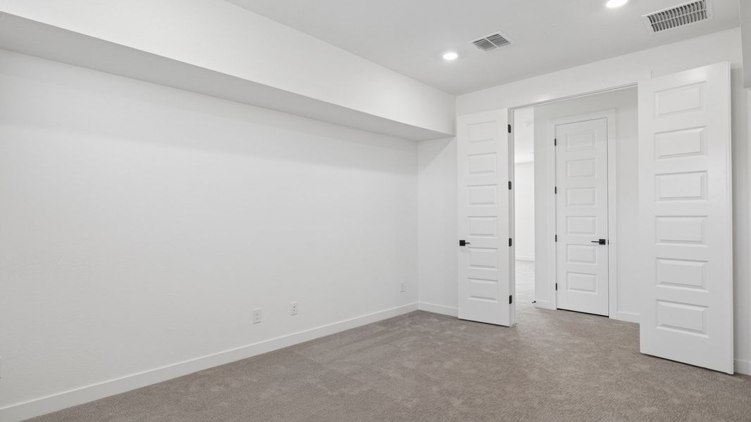 Representative unfurnished interior of a home built from the Phoenician by D.R. Horton in The Ridge at Stone Butte, Phoenix (Image 35).