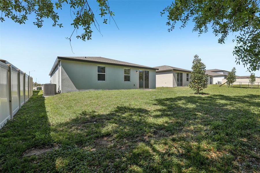 Exterior details and patio area of a home in Lawson Dunes - Signature Series, Haines City (Image 26).