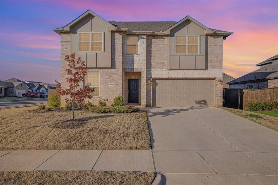 Front exterior of a new home in Courts Of Bonnie Brae, Denton, TX, highlighting curb appeal (Image 1). Front exterior of a new home in Courts Of Bonnie Brae, Denton, TX, highlighting curb appeal (Image 1).