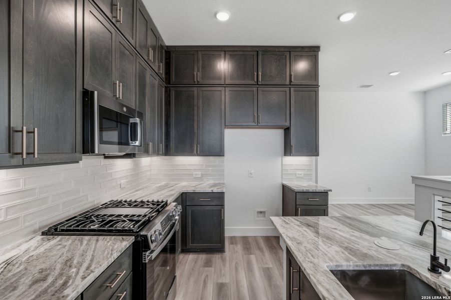 Furnished interior view inside a new home in Rose Hill, San Antonio (Image 6).