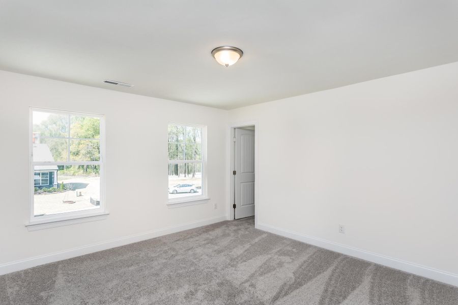 Spacious, unfurnished interior of a new home in Daniel Farms, Benson (Image 24).