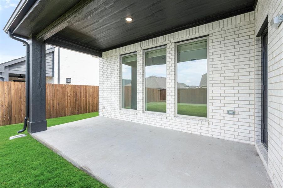 Exterior details and patio area of a home in Sonoma Verde, Rockwall (Image 22). Exterior details and patio area of a home in Sonoma Verde, Rockwall (Image 22).