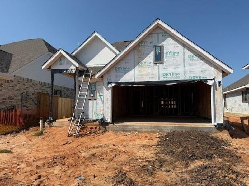 Front exterior of a new home in Grand Central Park, Conroe, TX, highlighting curb appeal (Image 5). Front exterior of a new home in Grand Central Park, Conroe, TX, highlighting curb appeal (Image 5).