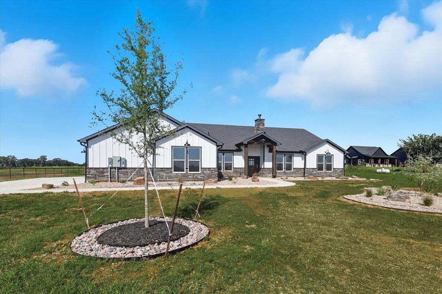 Front exterior of a new home in , Whitesboro, TX, highlighting curb appeal (Image 24). Front exterior of a new home in , Whitesboro, TX, highlighting curb appeal (Image 24).