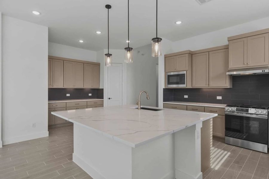 Representative furnished interior of a home built from the Nicklaus by Chesmar Homes in Riceland Alley Loads, Mont Belvieu (Image 11).