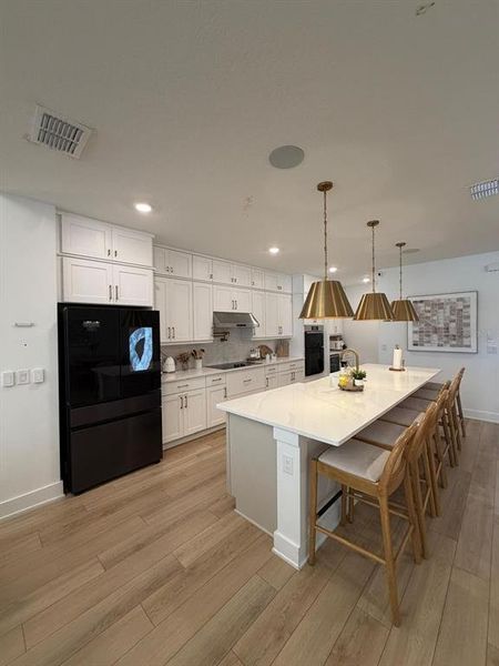 Furnished interior view inside a new home in , Winter Garden (Image 5).