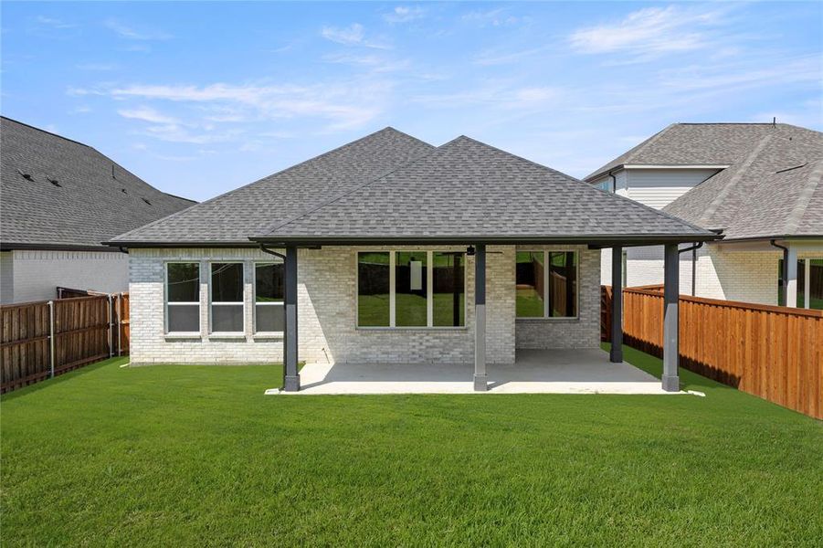 Front exterior of a new home in The Highlands, Rockwall, TX, highlighting curb appeal (Image 16). Front exterior of a new home in The Highlands, Rockwall, TX, highlighting curb appeal (Image 16).