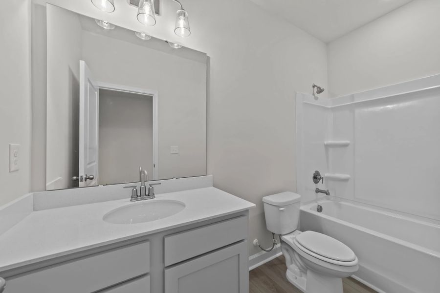 Furnished interior view inside a new home in Blue Heron Retreat: Oasis Series, Little River (Image 9).