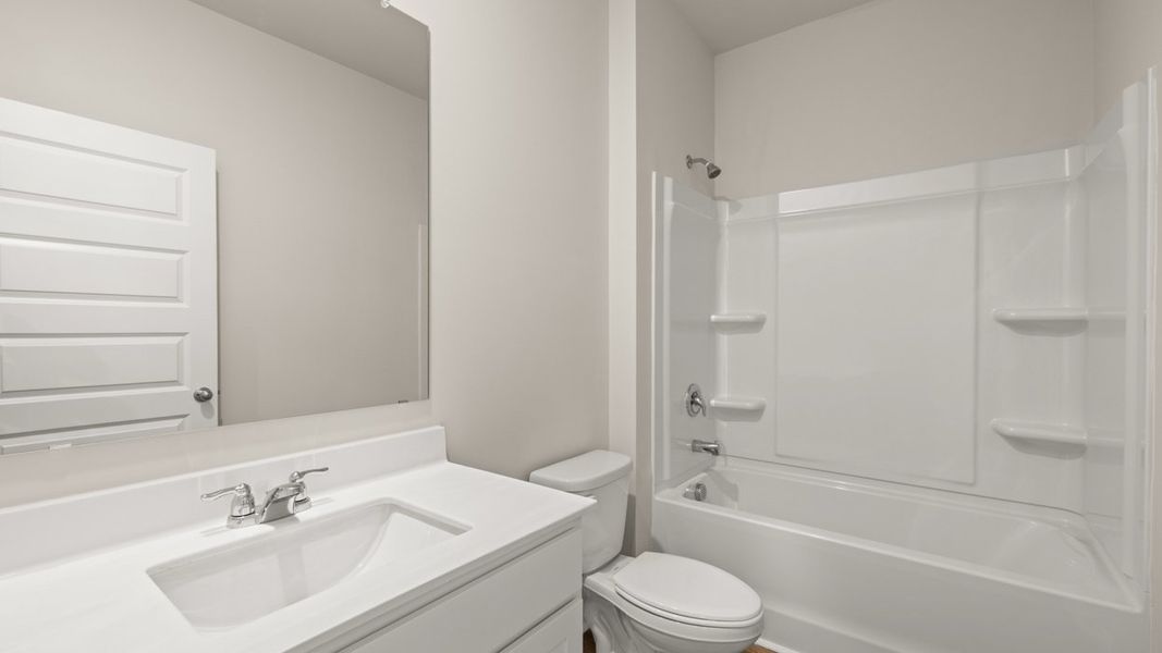 Furnished interior view inside a new home in Oakchase at Hampton, Hampton (Image 11).