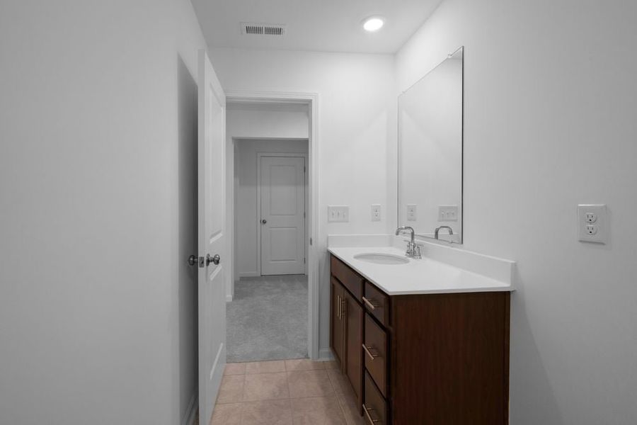Representative furnished interior of a home built from the Norcross by Taylor Morrison in Windance Lake, Loganville (Image 9).