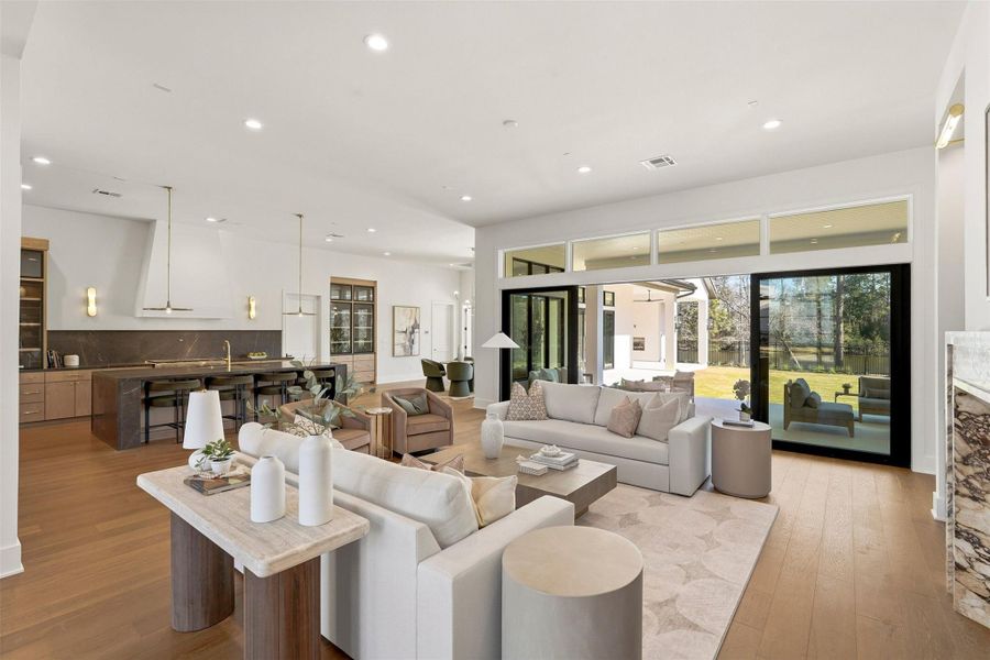 The incredible living space blends into the front-of-the-house show kitchen, one of two thoughtfully designed culinary spaces. The incredible living space blends into the front-of-the-house show kitchen, one of two thoughtfully designed culinary spaces.