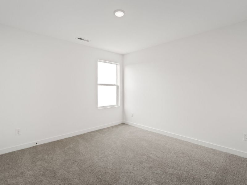Spacious, unfurnished interior of a new home in Sage Farms, White House (Image 32).