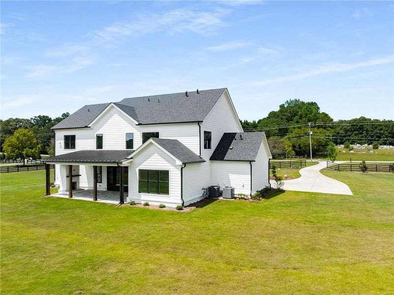Front exterior of a new home in , Alpharetta, GA, highlighting curb appeal (Image 29). Front exterior of a new home in , Alpharetta, GA, highlighting curb appeal (Image 29).