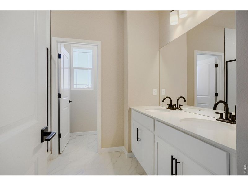 Furnished interior view inside a new home in Farmstead, Berthoud (Image 7).