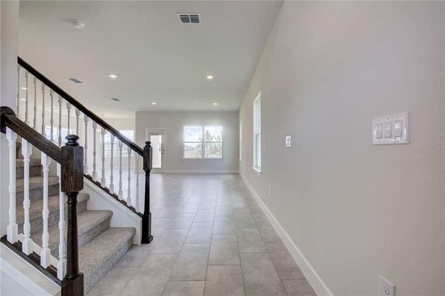 Spacious, unfurnished interior of a new home in Aviary at Rutland Ranch, Parrish (Image 14).