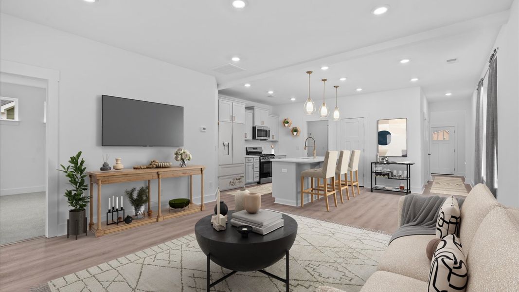 Memorable moments begin in this elegant, open family room with hardwood flooring and refined finishes located in Moore, SC