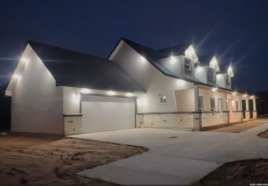 Front exterior of a new home in , Lytle, TX, highlighting curb appeal (Image 2). Front exterior of a new home in , Lytle, TX, highlighting curb appeal (Image 2).