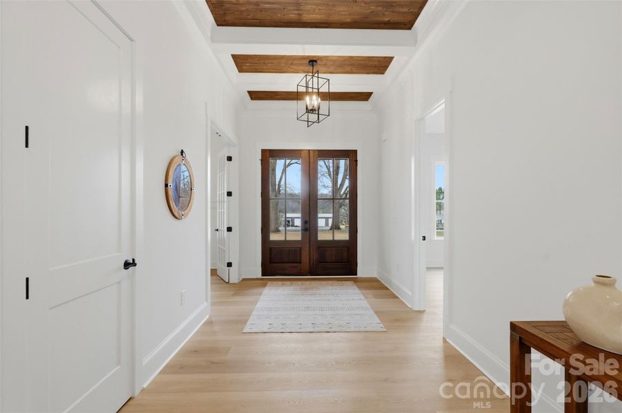 *representative photo- front foyer w/ 8ft mahogany doors and wood ceiling accent