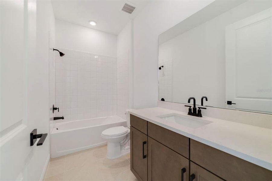Furnished interior view inside a new home in Vintner Reserve, Clermont (Image 10).