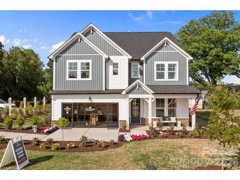 Front exterior of a new home in Windgate, Mooresville, NC, highlighting curb appeal (Image 1). Front exterior of a new home in Windgate, Mooresville, NC, highlighting curb appeal (Image 1).