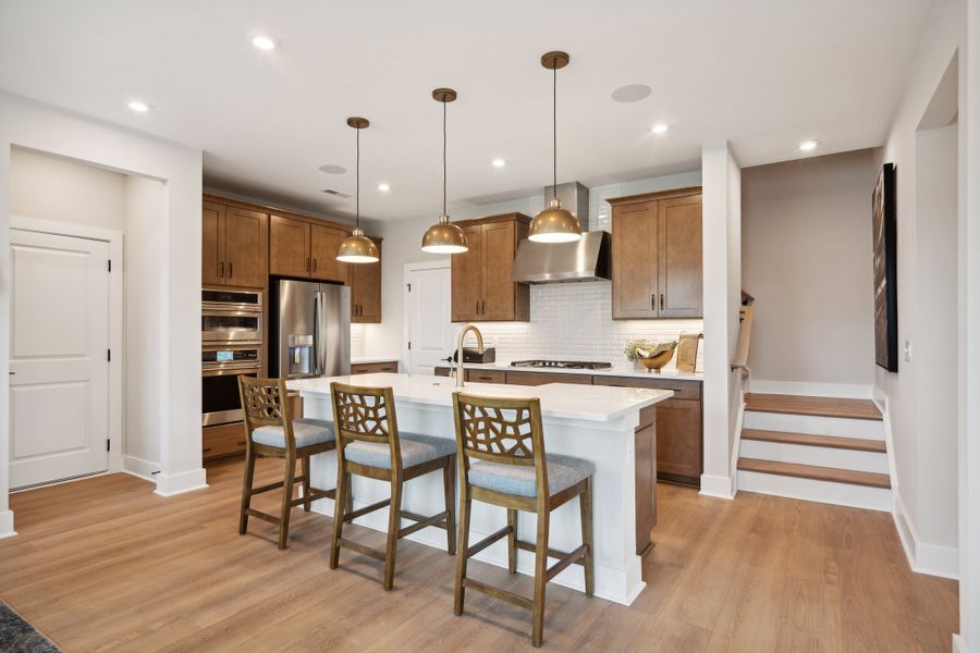 Representative furnished interior of a home built from the Torrence by Tri Pointe Homes in Seven Oaks, Belmont (Image 13).