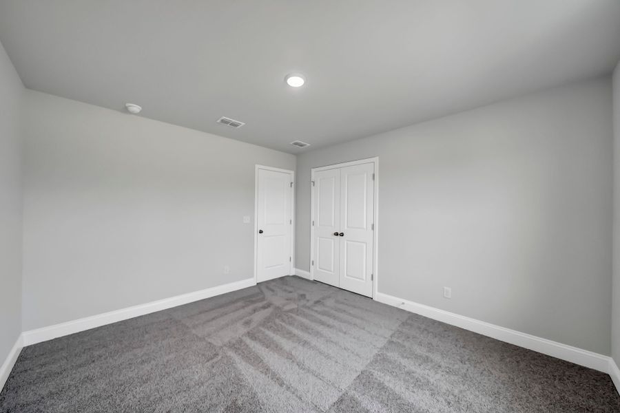 Spacious, unfurnished interior of a new home in Monroe Preserve, Chapin (Image 46).