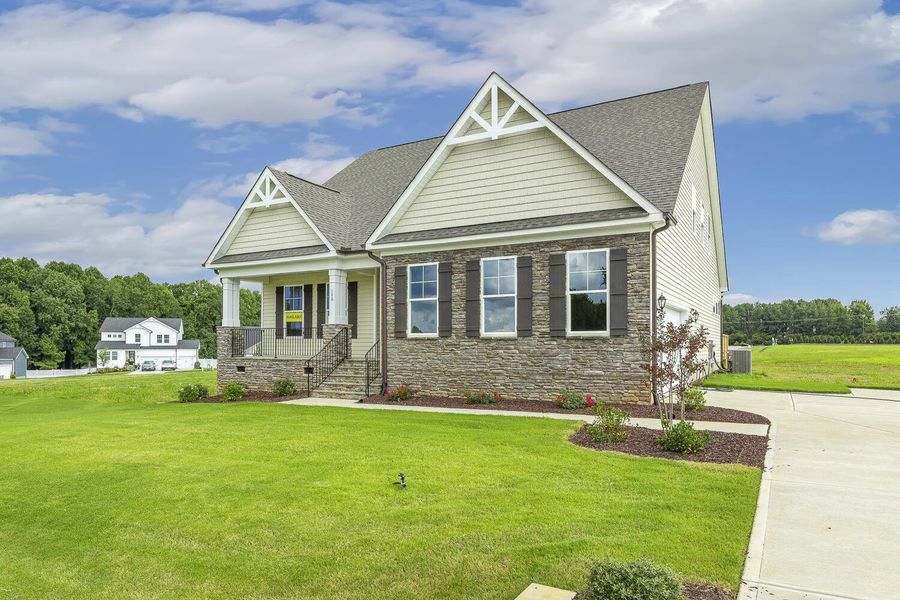Front exterior of a new home in Berea Farms, Four Oaks, NC, highlighting curb appeal (Image 23).