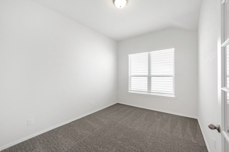 Representative exterior photo of a completed home built from the Bastrop by Impression Homes in Heartland, Heartland, TX (Image 17).