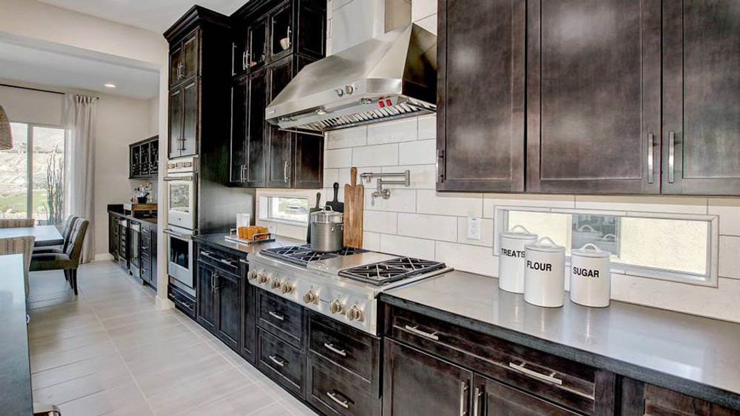 Representative furnished interior of a home built from the Shire by Taylor Morrison in Victory at Verrado Venture II Collection 55+, Buckeye (Image 14).