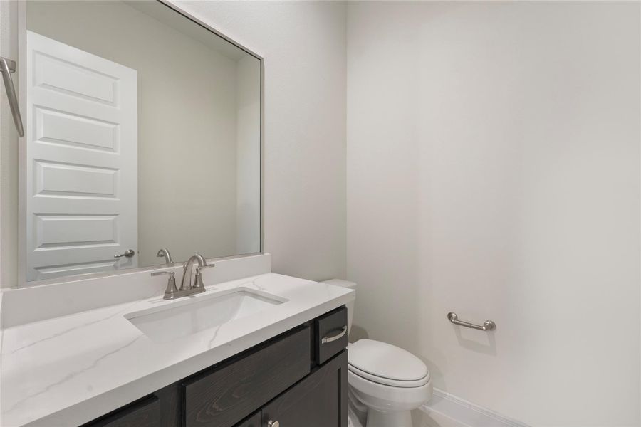 Furnished interior view inside a new home in The Corner At Buffalo Pointe, Houston (Image 14). Furnished interior view inside a new home in The Corner At Buffalo Pointe, Houston (Image 14).