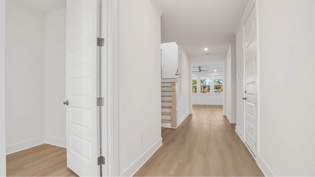Representative unfurnished interior of a home built from the Trenton by D.R. Horton in Parkside, Santa Rosa Beach (Image 12).