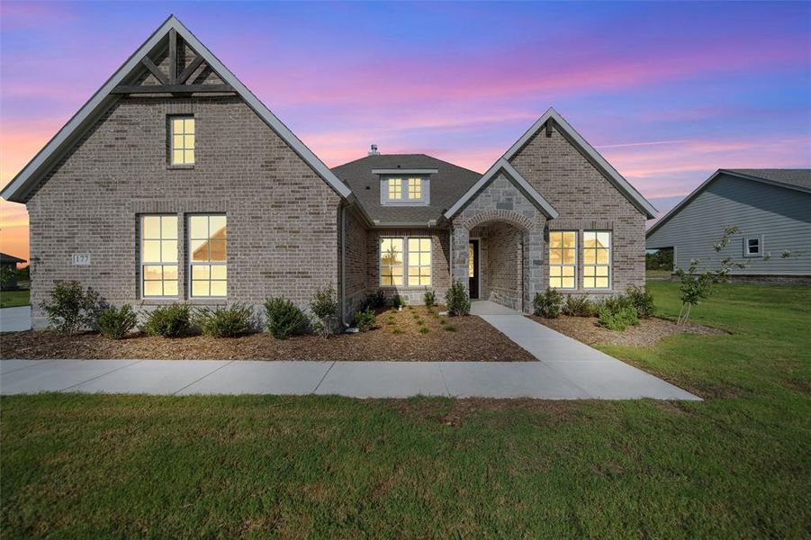 Front exterior of a new home in Fairview Meadows, New Fairview, TX, highlighting curb appeal (Image 18). Front exterior of a new home in Fairview Meadows, New Fairview, TX, highlighting curb appeal (Image 18).