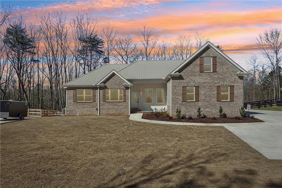 Front exterior of a new home in , Canton, GA, highlighting curb appeal (Image 33). Front exterior of a new home in , Canton, GA, highlighting curb appeal (Image 33).