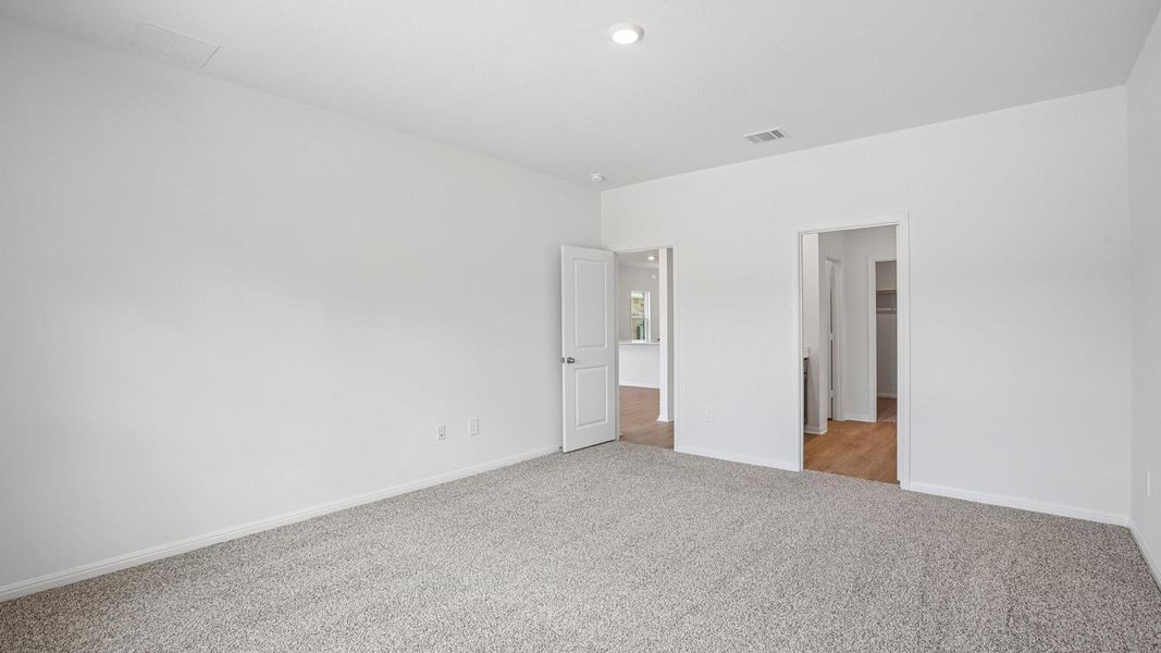 Spacious, unfurnished interior of a new home in Bar W Ranch, Leander (Image 37).