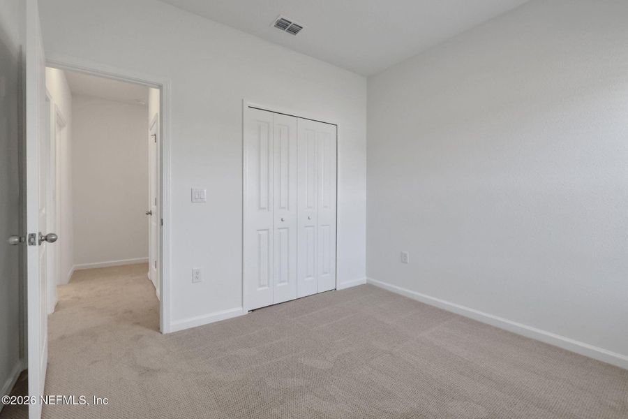 Spacious, unfurnished interior of a new home in Brook Forest, St. Augustine (Image 23).