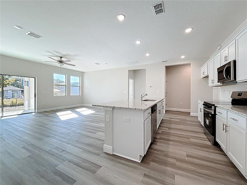 Furnished interior view inside a new home in , North Port (Image 8).