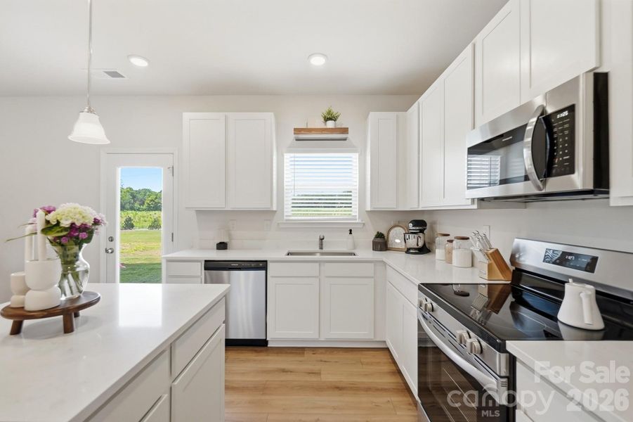 Furnished interior view inside a new home in Pine Bluff, Midland (Image 9).