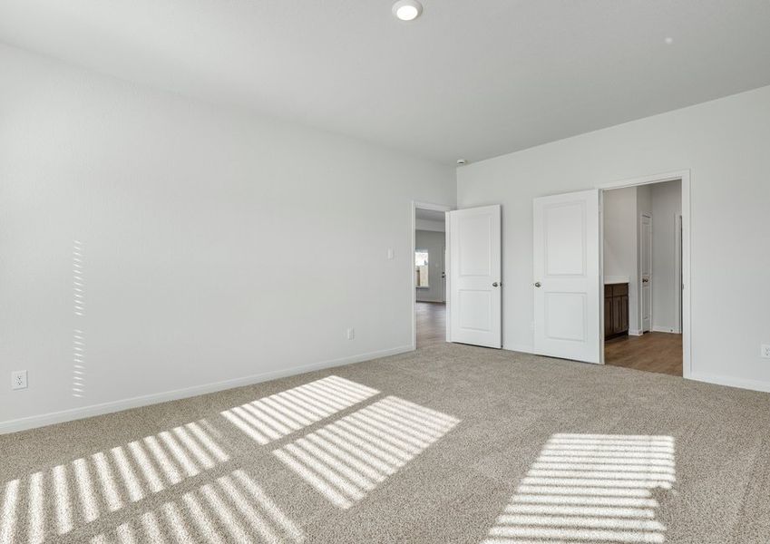 The master suite has a large bedroom, ensuite bathroom and walk-in closet.