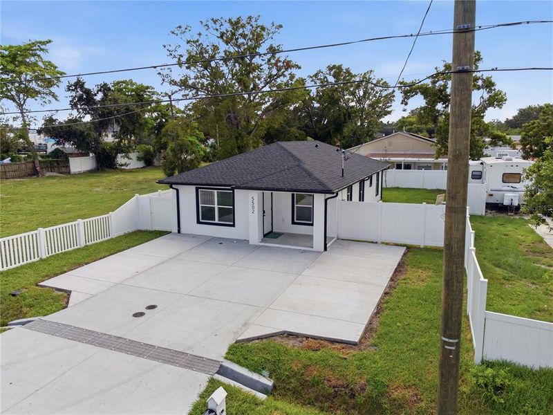 Front exterior of a new home in , Tampa, FL, highlighting curb appeal (Image 1). Front exterior of a new home in , Tampa, FL, highlighting curb appeal (Image 1).