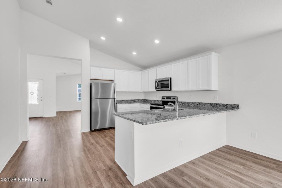 Furnished interior view inside a new home in Rolling Hills, Green Cove Springs (Image 7).