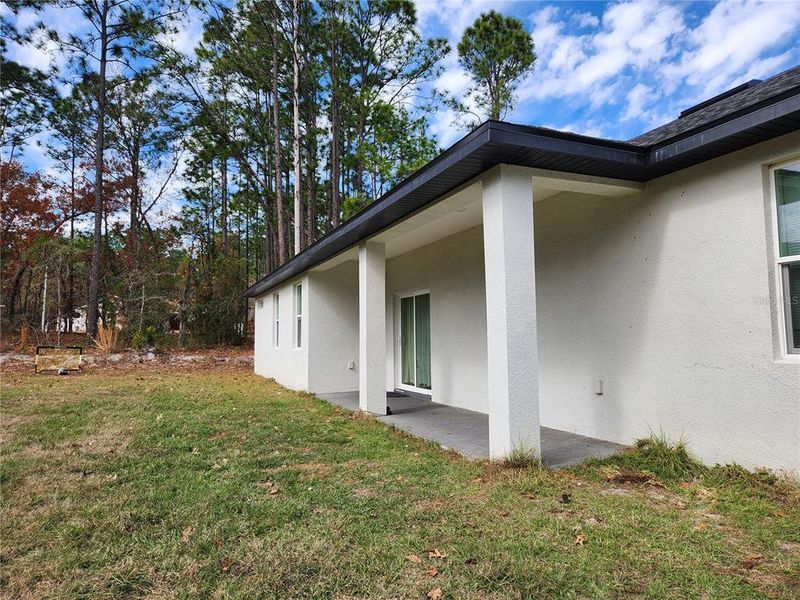 Exterior details and patio area of a home in , Ocala (Image 45).
