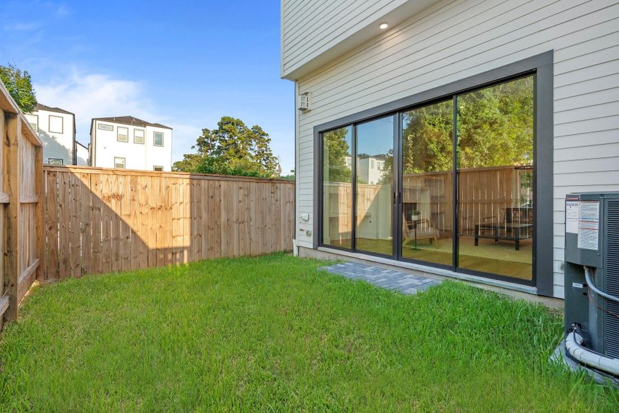 Exterior details and patio area of a home in , Houston (Image 3). Exterior details and patio area of a home in , Houston (Image 3).