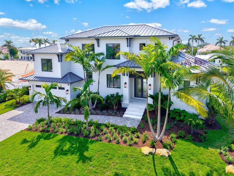 Front exterior of a new home in , Longboat Key, FL, highlighting curb appeal (Image 30). Front exterior of a new home in , Longboat Key, FL, highlighting curb appeal (Image 30).