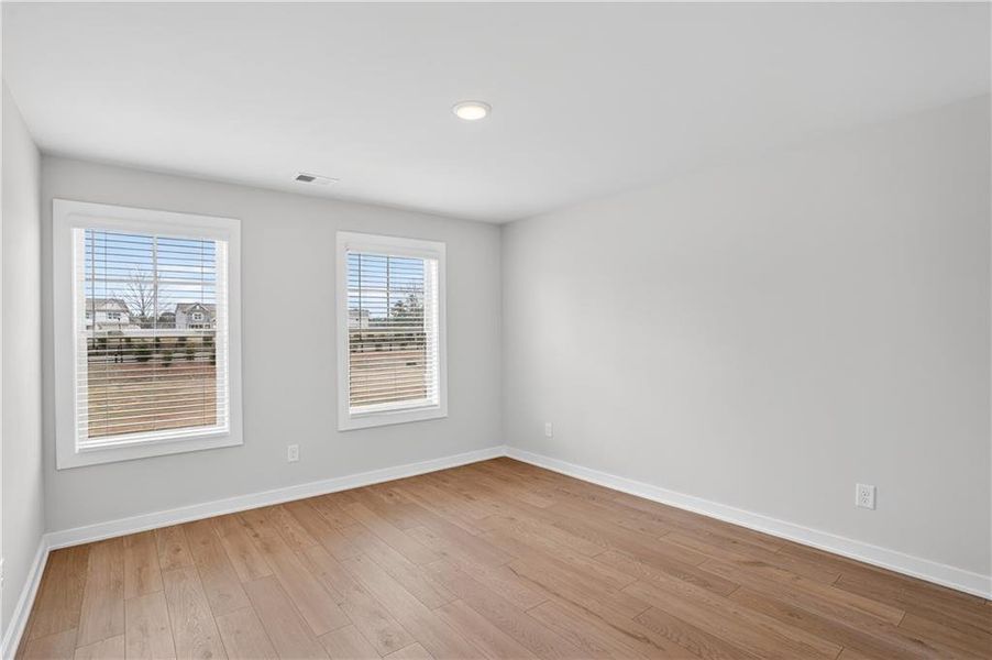 Spacious, unfurnished interior of a new home in The Fairways at Mirror Lake, Villa Rica (Image 26).
