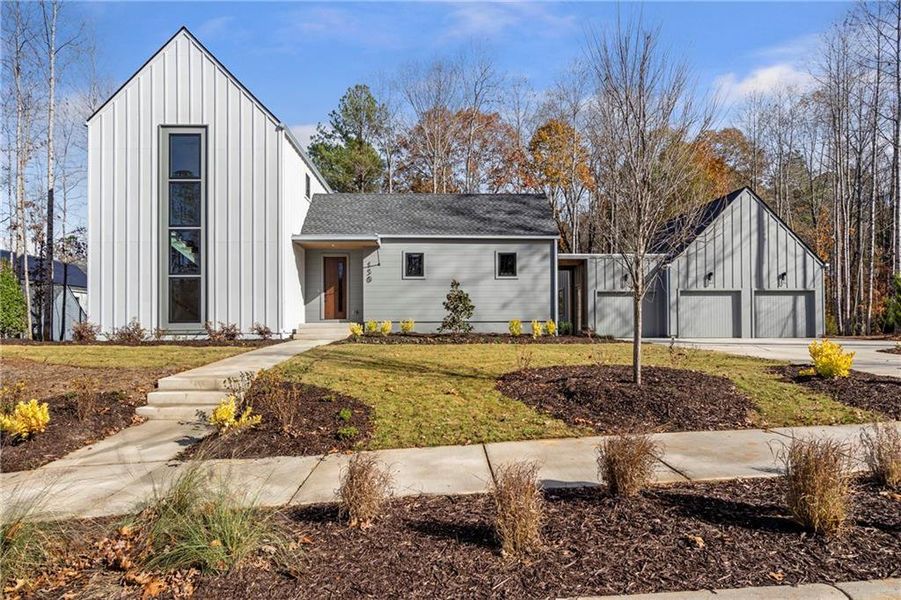 Front exterior of a new home in Aster, Roswell, GA, highlighting curb appeal (Image 2). Front exterior of a new home in Aster, Roswell, GA, highlighting curb appeal (Image 2).
